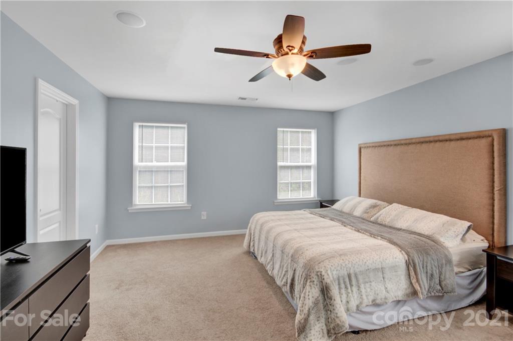 78174 Rillstone Drive Lancaster, SC 29720 - Photo 22 of 33 a bedroom with a large bed and a window