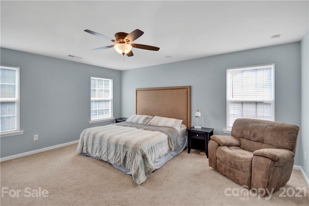 78174 Rillstone Drive Lancaster, SC 29720 - Photo 23 of 33 a bedroom with bed couch and window