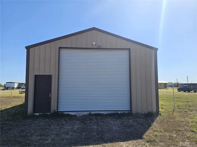 a house view with a backyard space
