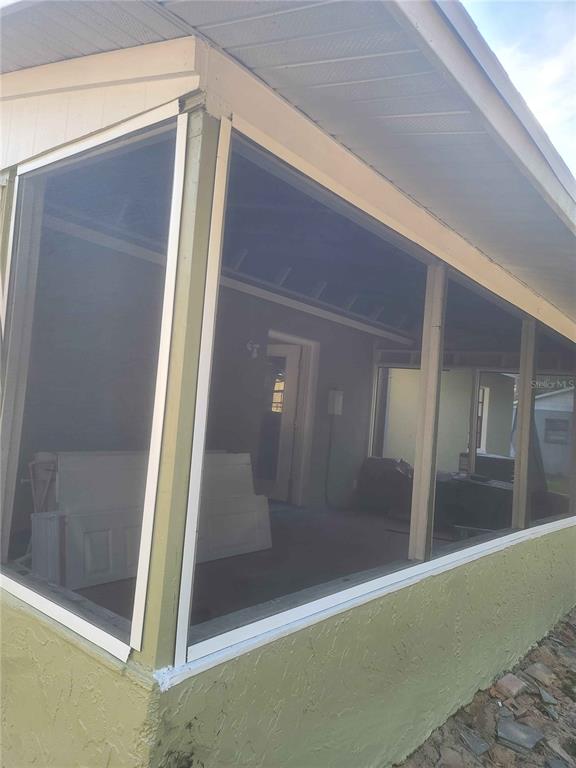 1187 Varnado Road Groveland, FL 34736 - Photo 18 of 25 a view of a glass door of the house
