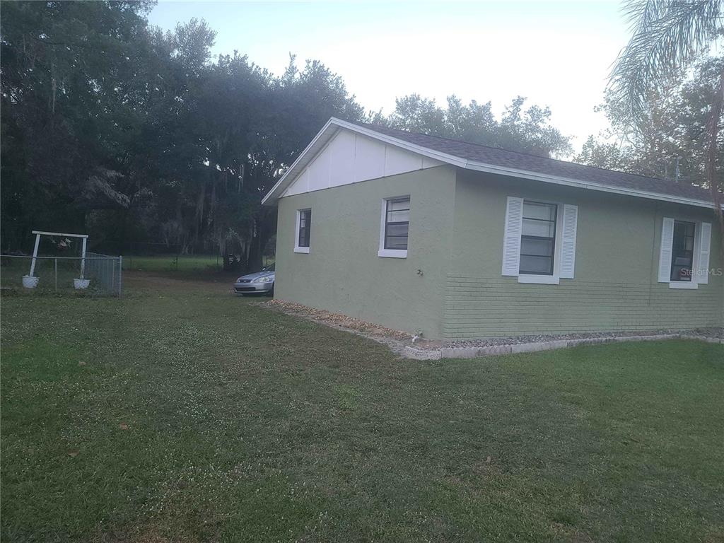 1187 Varnado Road Groveland, FL 34736 - Photo 2 of 25 a view of a house with backyard