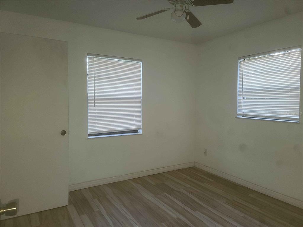 1187 Varnado Road Groveland, FL 34736 - Photo 10 of 25 an empty room with a window