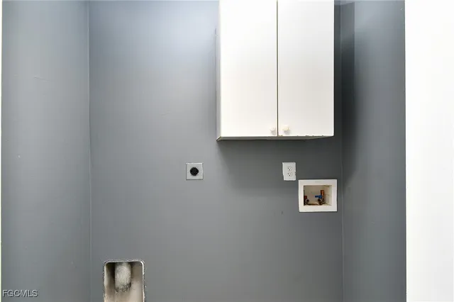 a bathroom with a sink toilet tub and shower