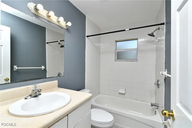 a view of a room with sliding glass door and mountain view