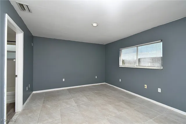 a bathroom with a sink toilet a mirror and shower