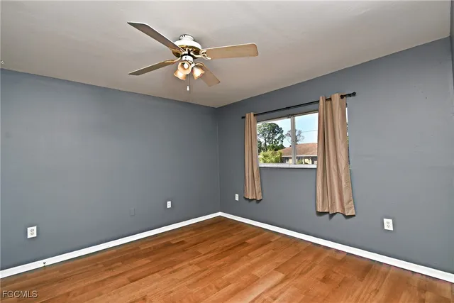 a kitchen with a sink stove and microwave