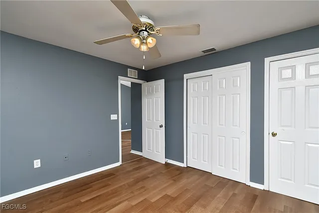 a kitchen with stainless steel appliances a refrigerator stove and microwave