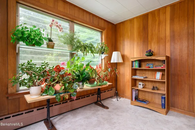 a outdoor living space with furniture and a potted plant