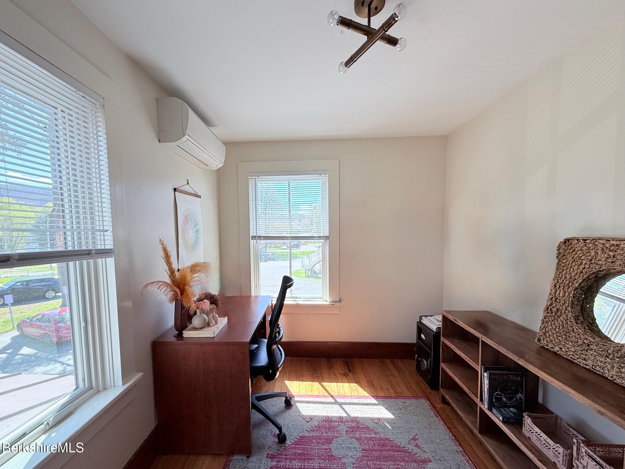 783 Main Street Great Barrington, MA 01230 - Photo 13 of 31 a livingroom with workspace and a window