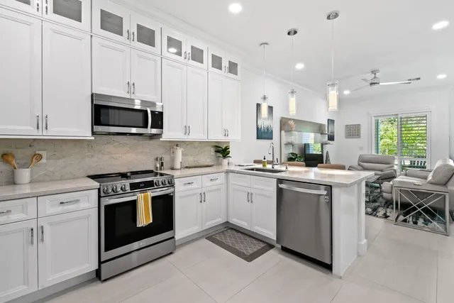 a bathroom with a sink a mirror and vanity