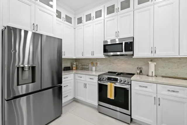 a bathroom with a toilet and a window