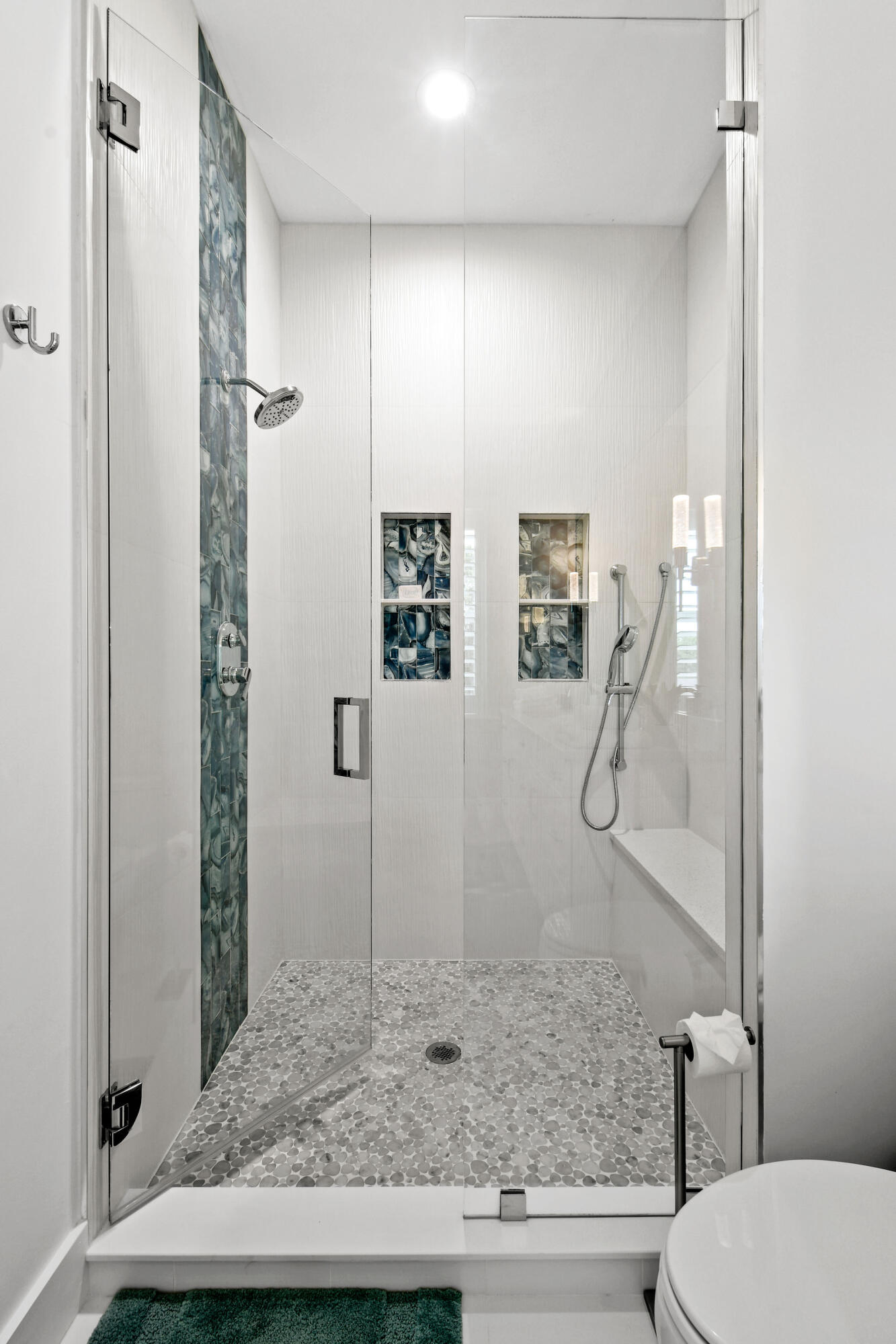 4650 Southeast Manatee Terrace Stuart, FL 34997 - Photo 26 of 95 a bathroom with a granite countertop sink and a mirror