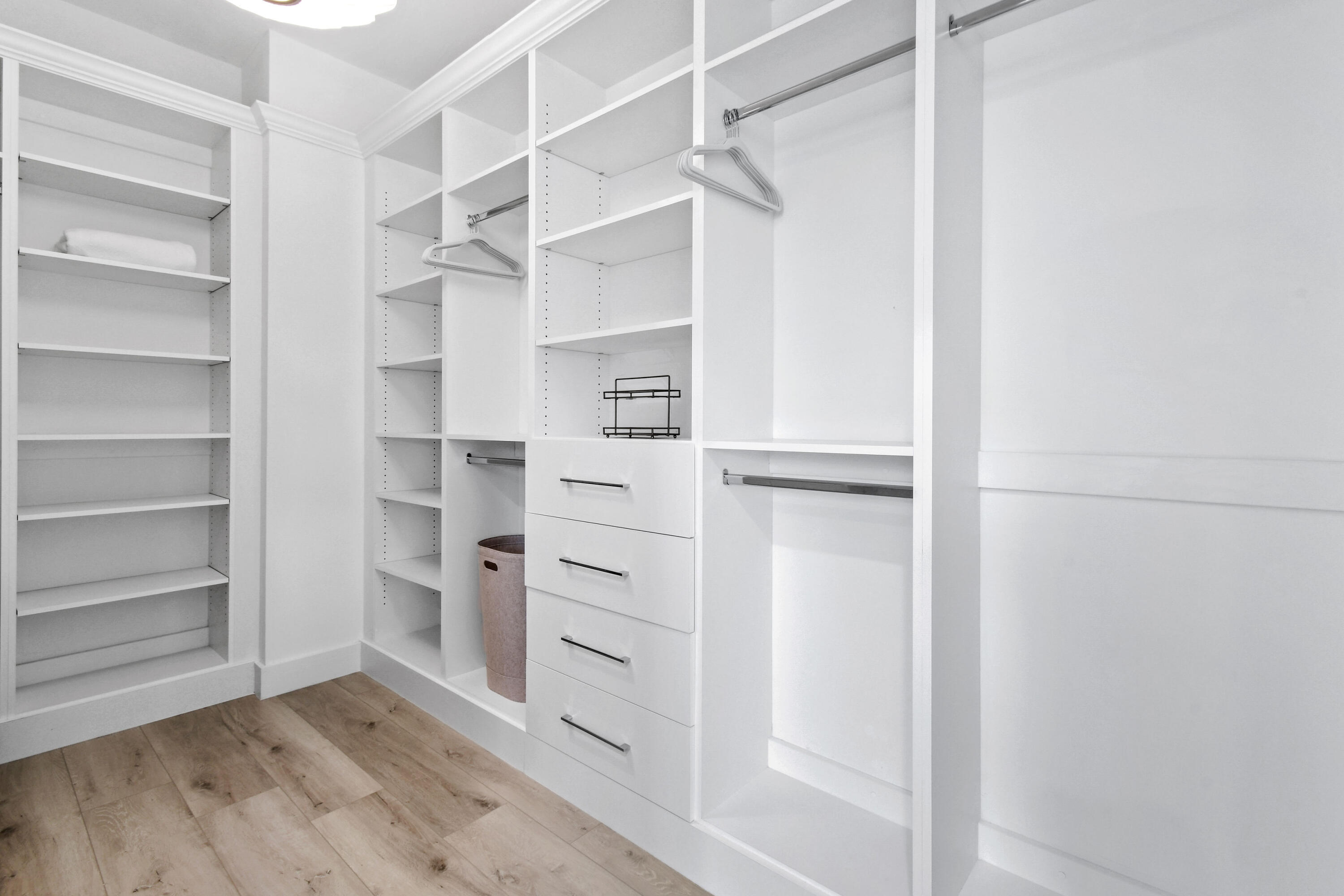 4650 Southeast Manatee Terrace Stuart, FL 34997 - Photo 27 of 95 a view of walk in closet with empty racks