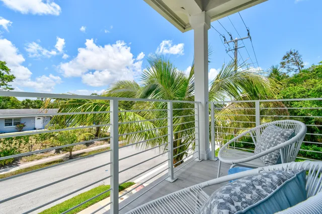 a view of a chairs and table in the terrace