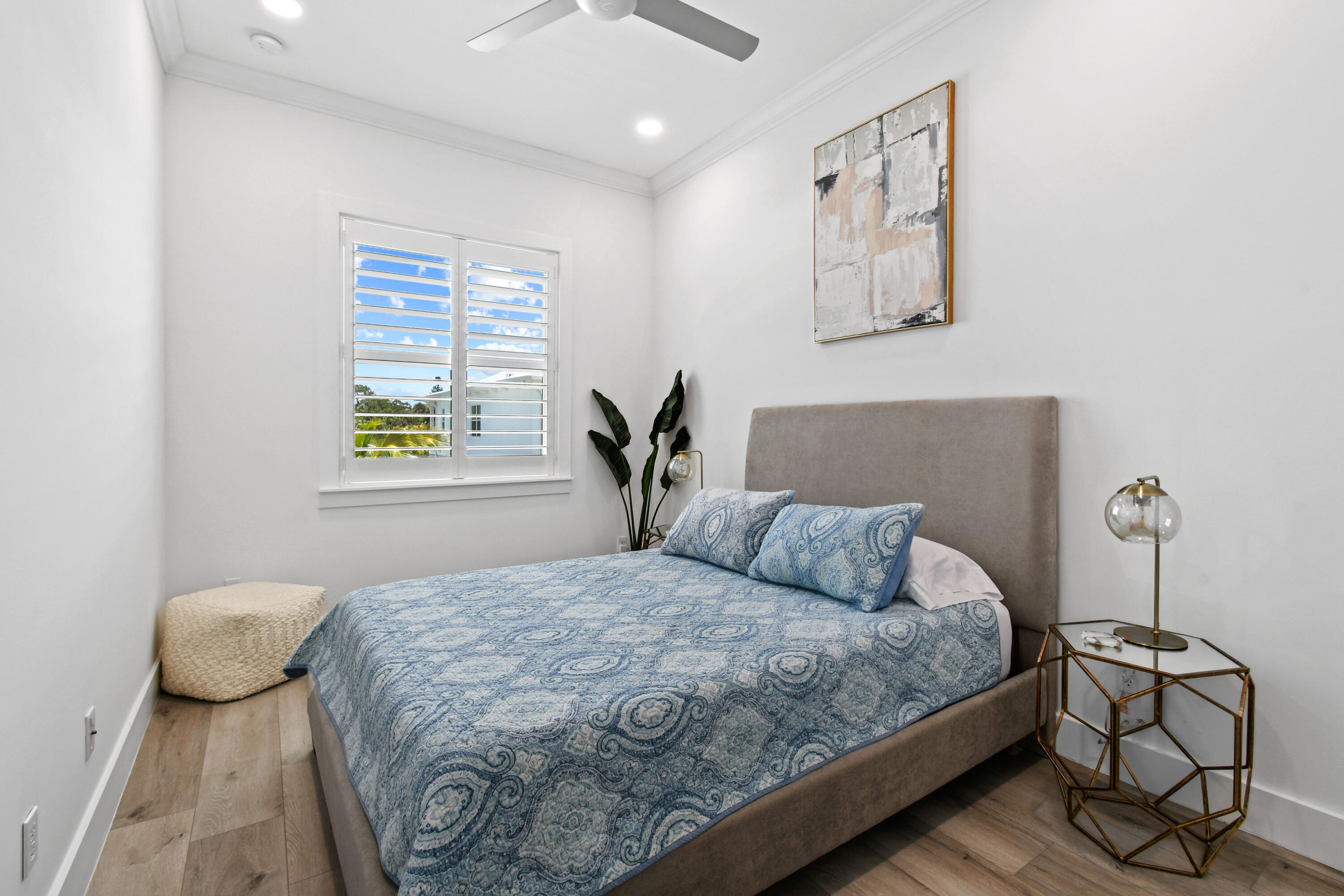 4650 Southeast Manatee Terrace Stuart, FL 34997 - Photo 35 of 95 a bedroom with a bed and window