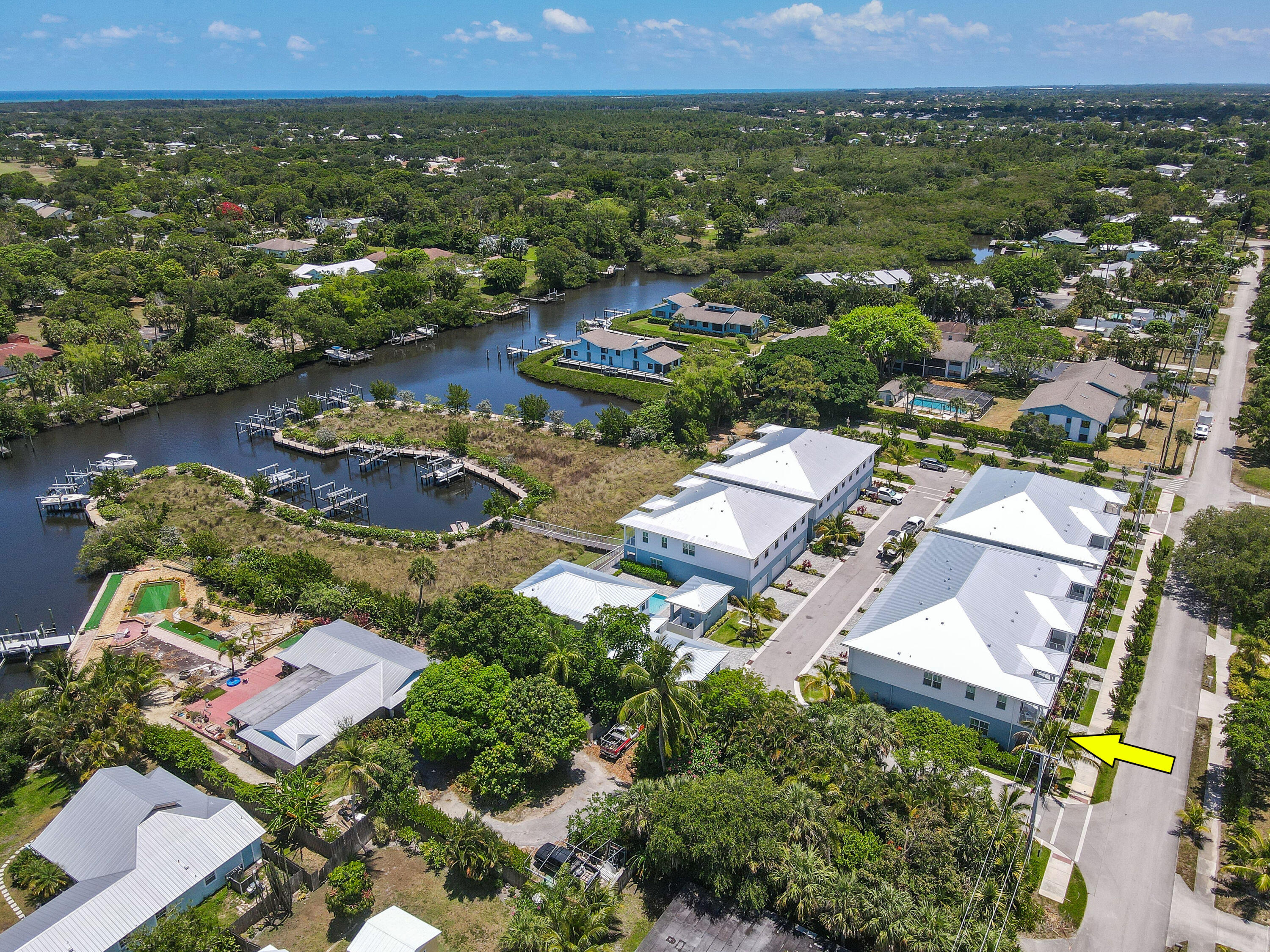 4650 Southeast Manatee Terrace Stuart, FL 34997 - Photo 91 of 95 an aerial view of residential houses with outdoor space