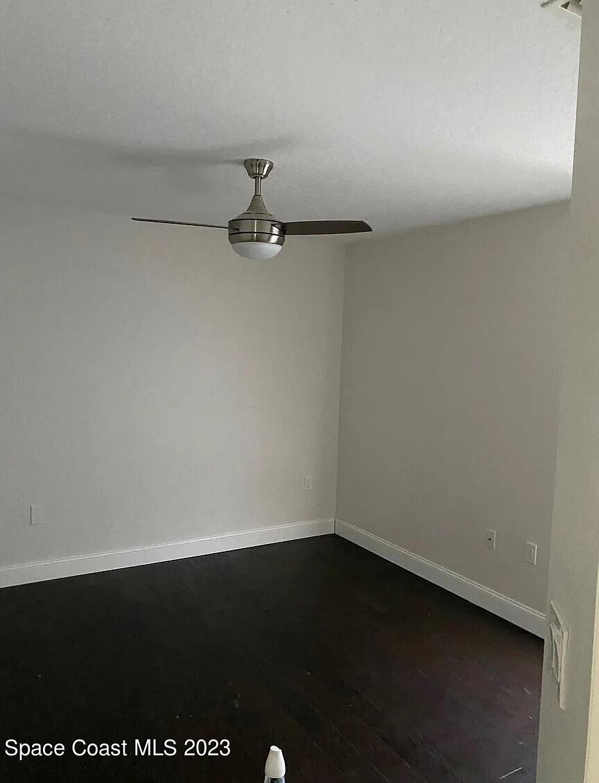 1913 Gloria Circle Palm Bay, FL 32905 - Photo 14 of 18 a view of a small space with wooden floor