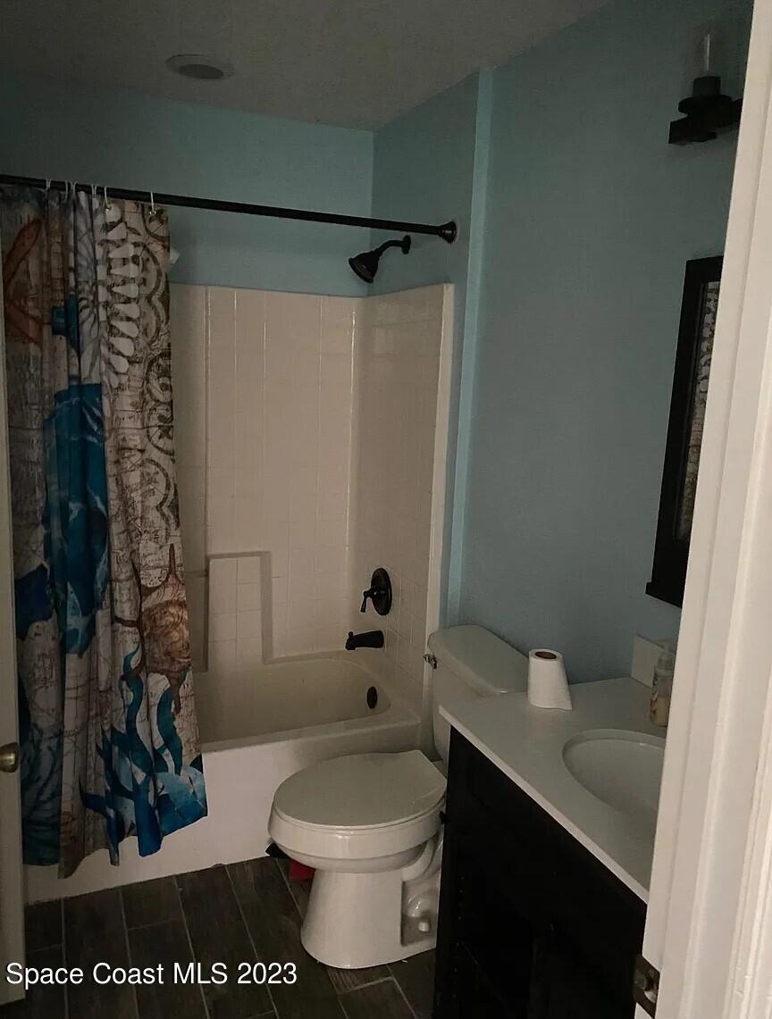 1913 Gloria Circle Palm Bay, FL 32905 - Photo 16 of 18 a bathroom with a toilet and a shower