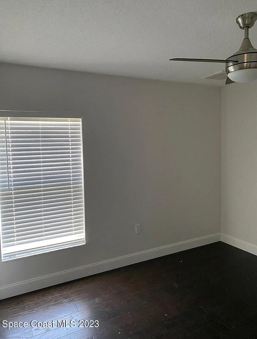 1913 Gloria Circle Palm Bay, FL 32905 - Photo 18 of 18 an empty room with a window