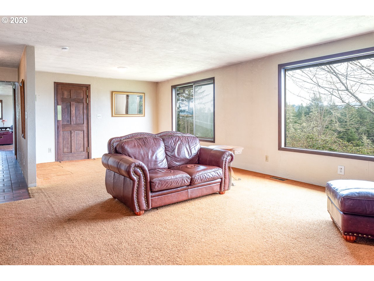 31514 Berlin Road Lebanon, OR 97355 - Photo 12 of 47 a living room with furniture and a large window