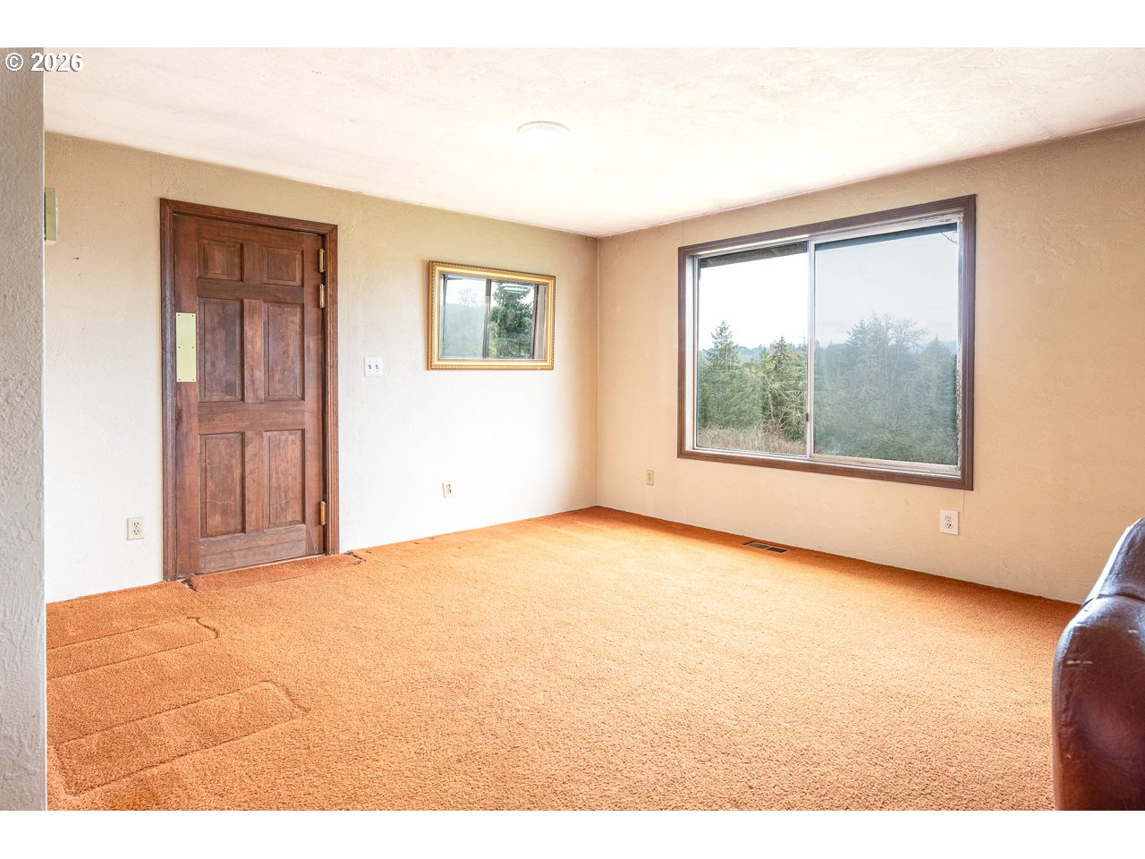 31514 Berlin Road Lebanon, OR 97355 - Photo 13 of 47 a view of an empty room with a window