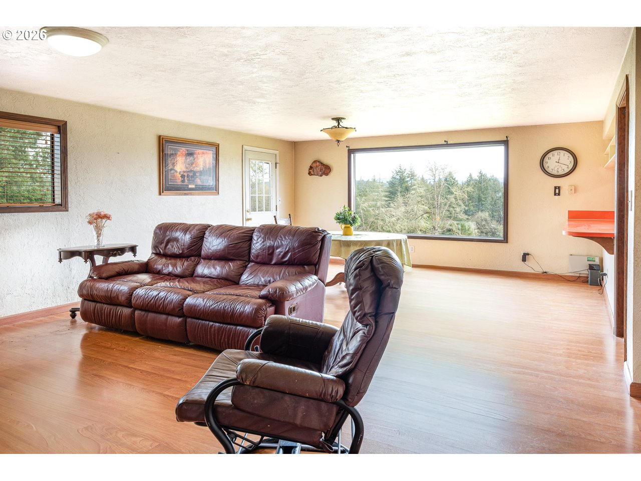 31514 Berlin Road Lebanon, OR 97355 - Photo 21 of 47 a living room with furniture and a large window