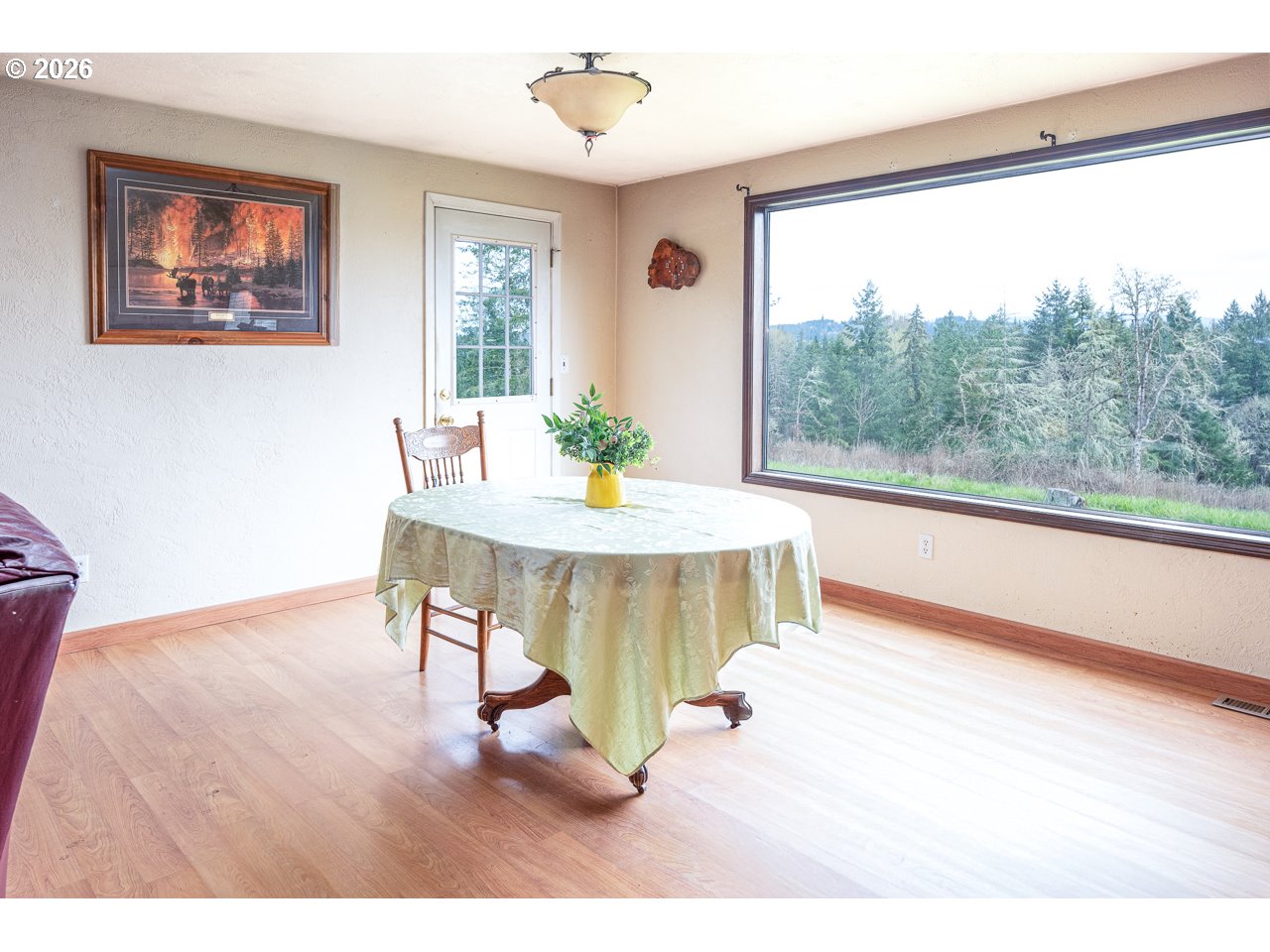31514 Berlin Road Lebanon, OR 97355 - Photo 22 of 47 a view of a dining room with furniture window and outside view