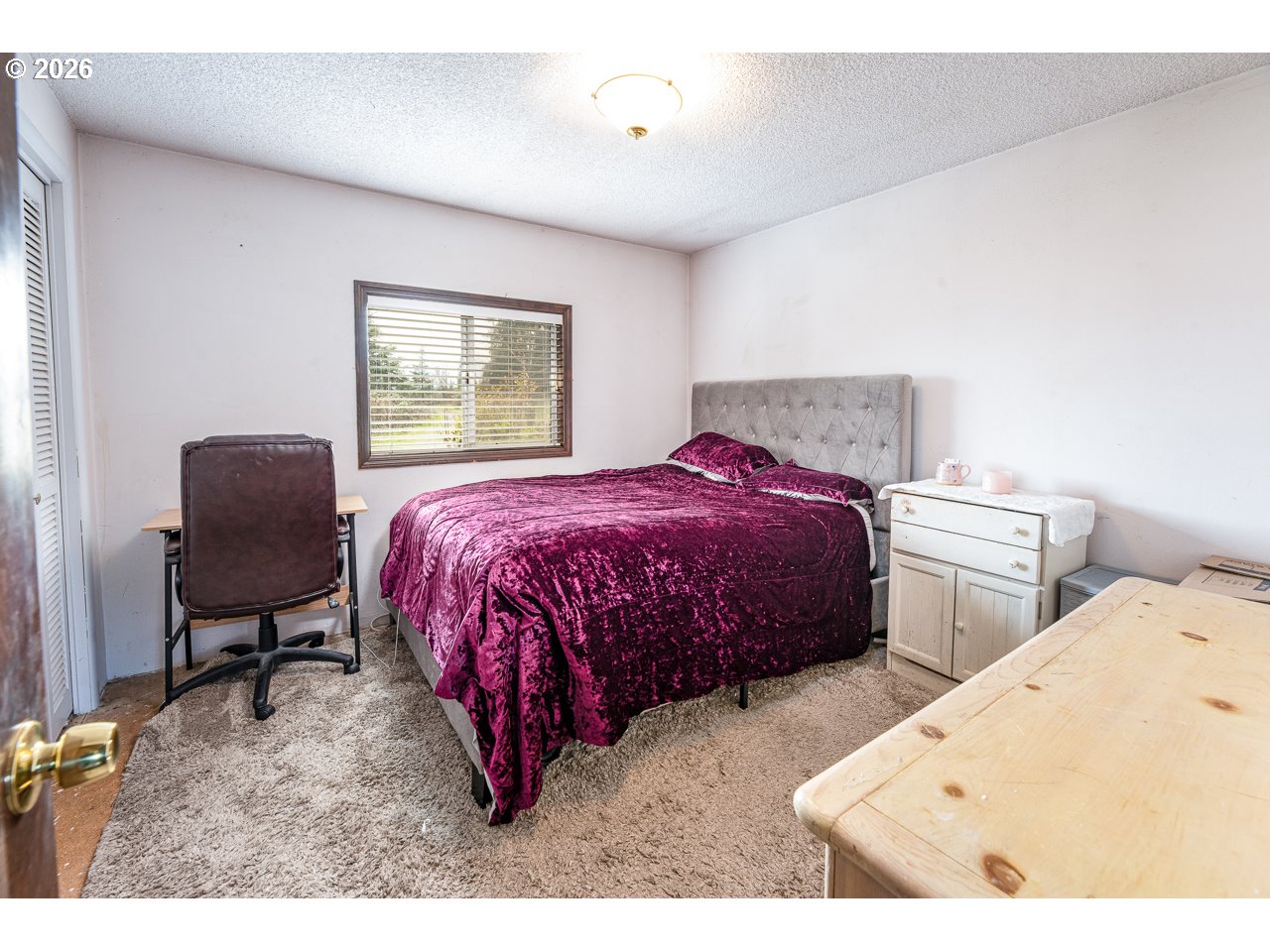 31514 Berlin Road Lebanon, OR 97355 - Photo 29 of 47 a bedroom with two beds and a chair