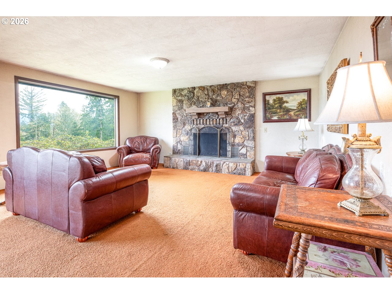 31514 Berlin Road Lebanon, OR 97355 - Photo 9 of 47 a living room with furniture and a fireplace