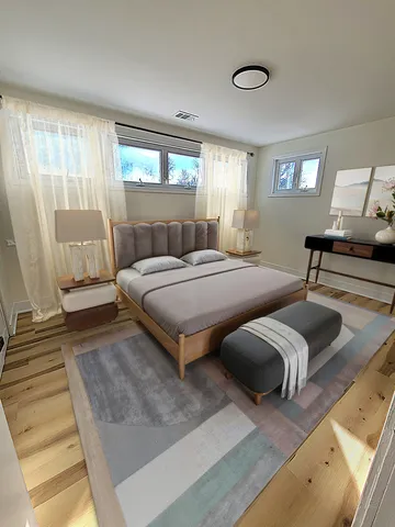 a bedroom with bed and window