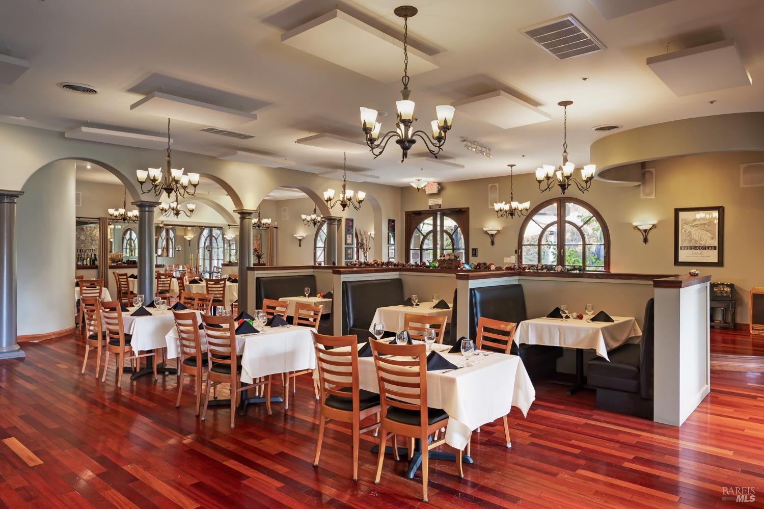 8050 Bodega Avenue Sebastopol, CA 95472 - Photo 12 of 45 a view of a dining room with furniture a chandelier and wooden floor