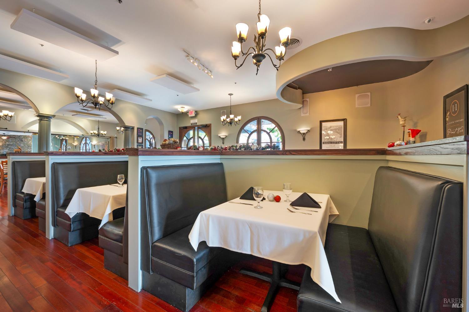 8050 Bodega Avenue Sebastopol, CA 95472 - Photo 13 of 45 a view of a dining room with furniture and wooden floor