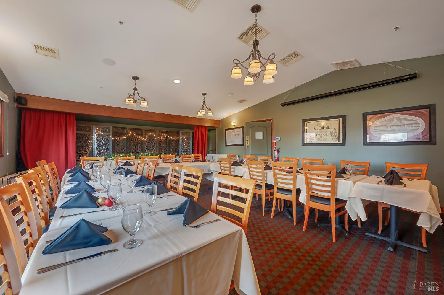 8050 Bodega Avenue Sebastopol, CA 95472 - Photo 14 of 45 a living room with lots of white furniture and chandelier