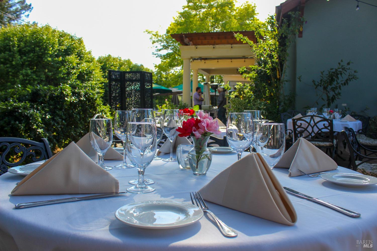8050 Bodega Avenue Sebastopol, CA 95472 - Photo 40 of 45 a view of a dining room with furniture and a potted plant