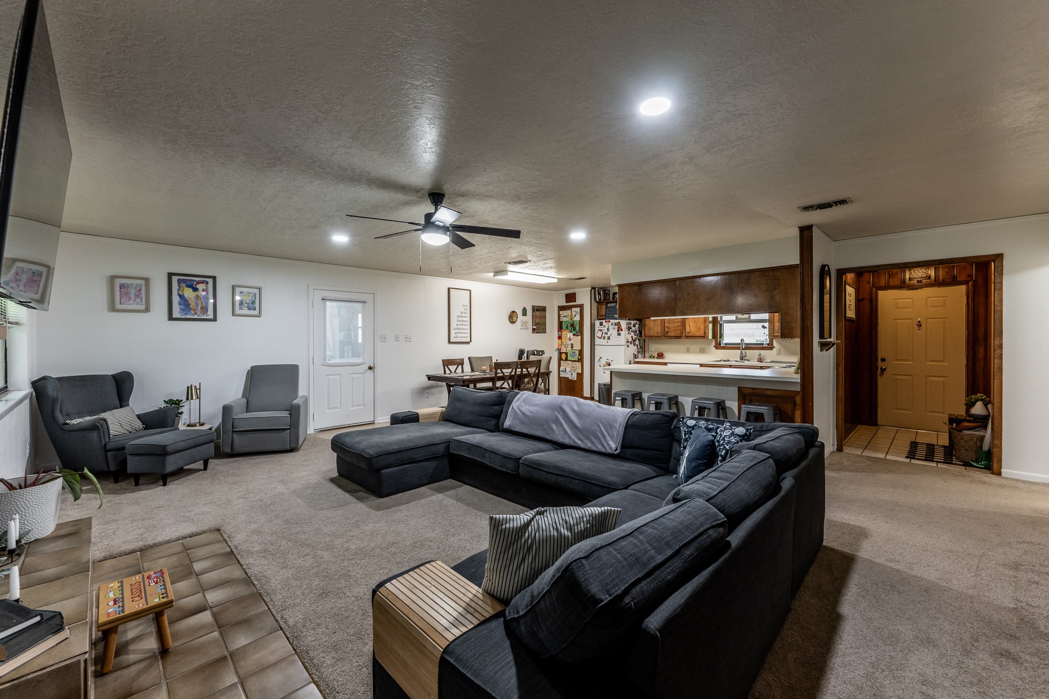 3304 Parr Drive Huntsville, TX 77320 - Photo 12 of 40 a living room with furniture and a glass door