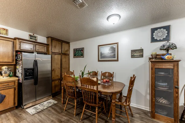 a view of a dining room with furniture