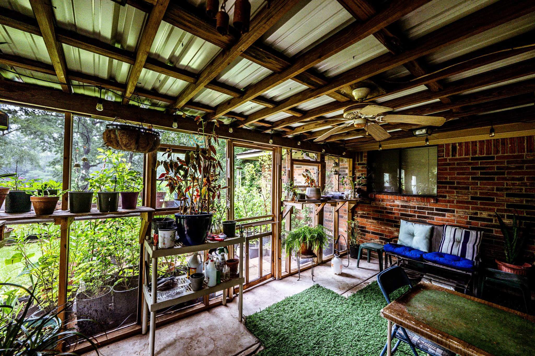 3304 Parr Drive Huntsville, TX 77320 - Photo 23 of 40 a room with lots of furniture and a potted plant