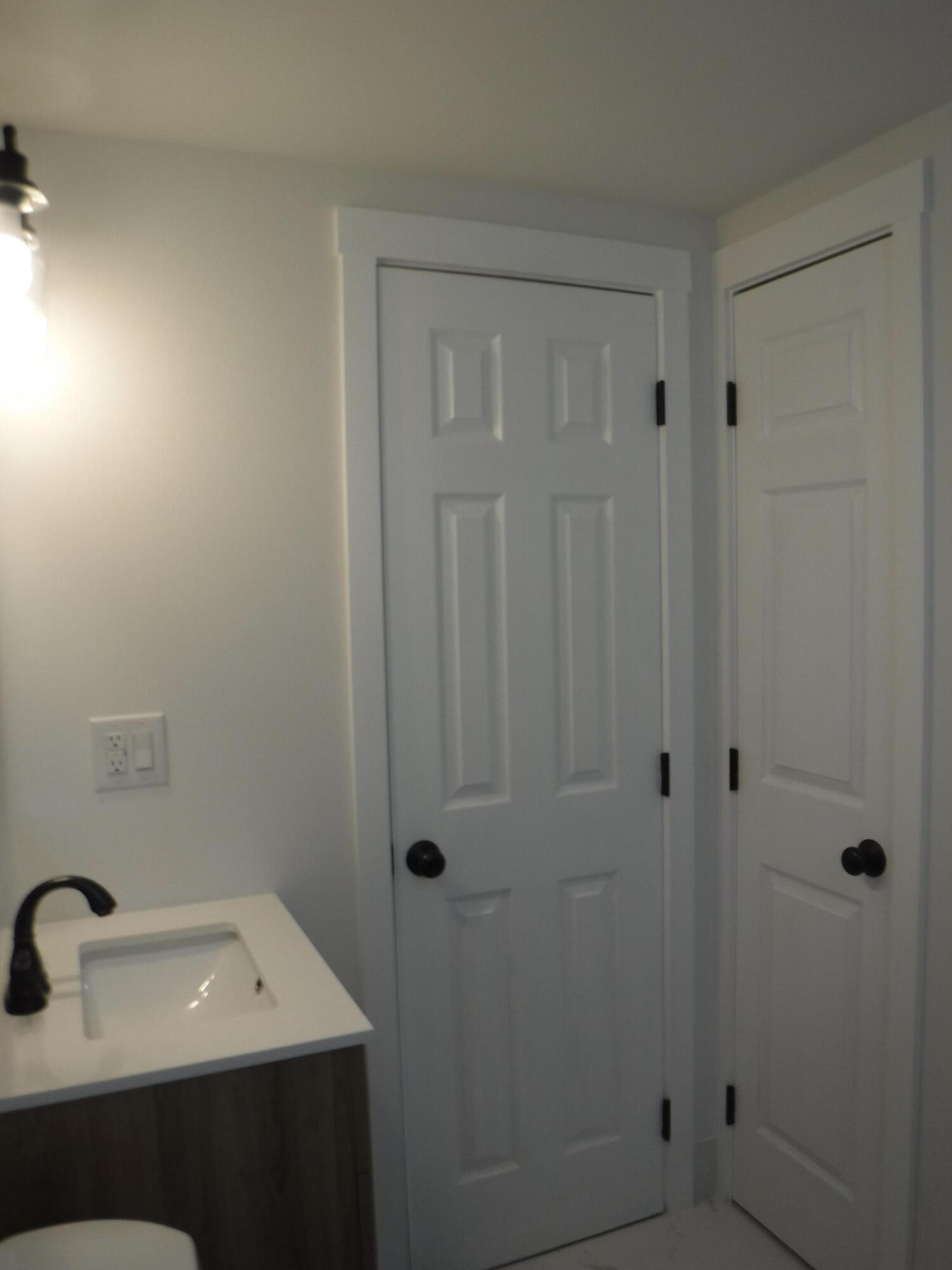 1280 Sunset Road West Palm Beach, FL 33406 - Photo 12 of 24 a bathroom with a sink and vanity