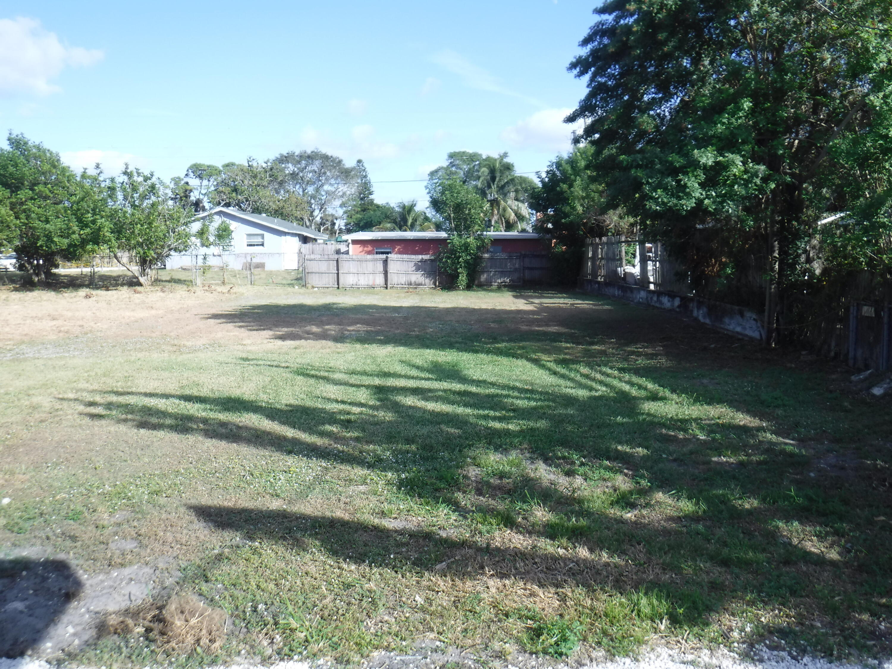 1280 Sunset Road West Palm Beach, FL 33406 - Photo 17 of 24 a view of a back yard