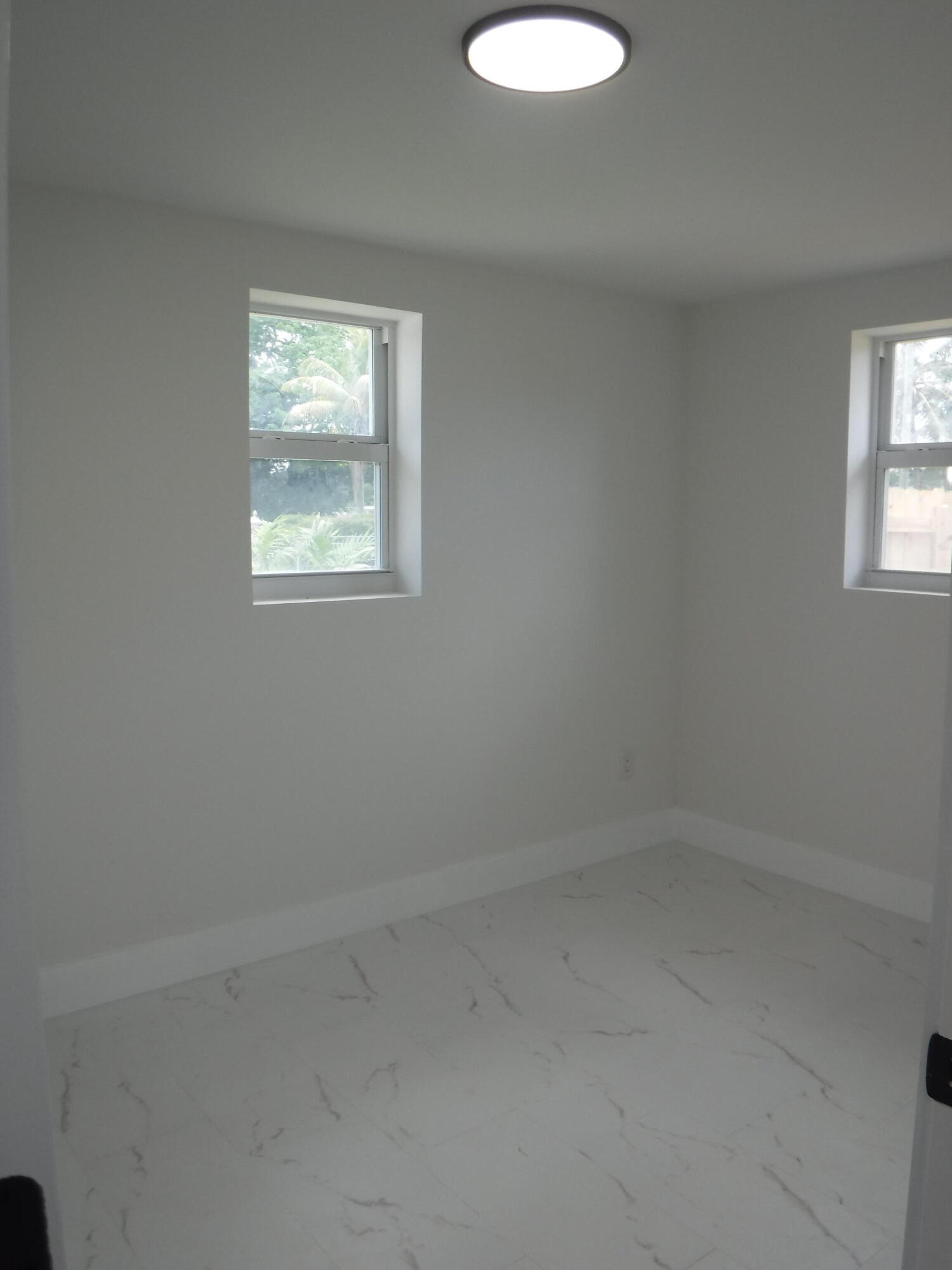 1280 Sunset Road West Palm Beach, FL 33406 - Photo 7 of 24 an empty room with a window