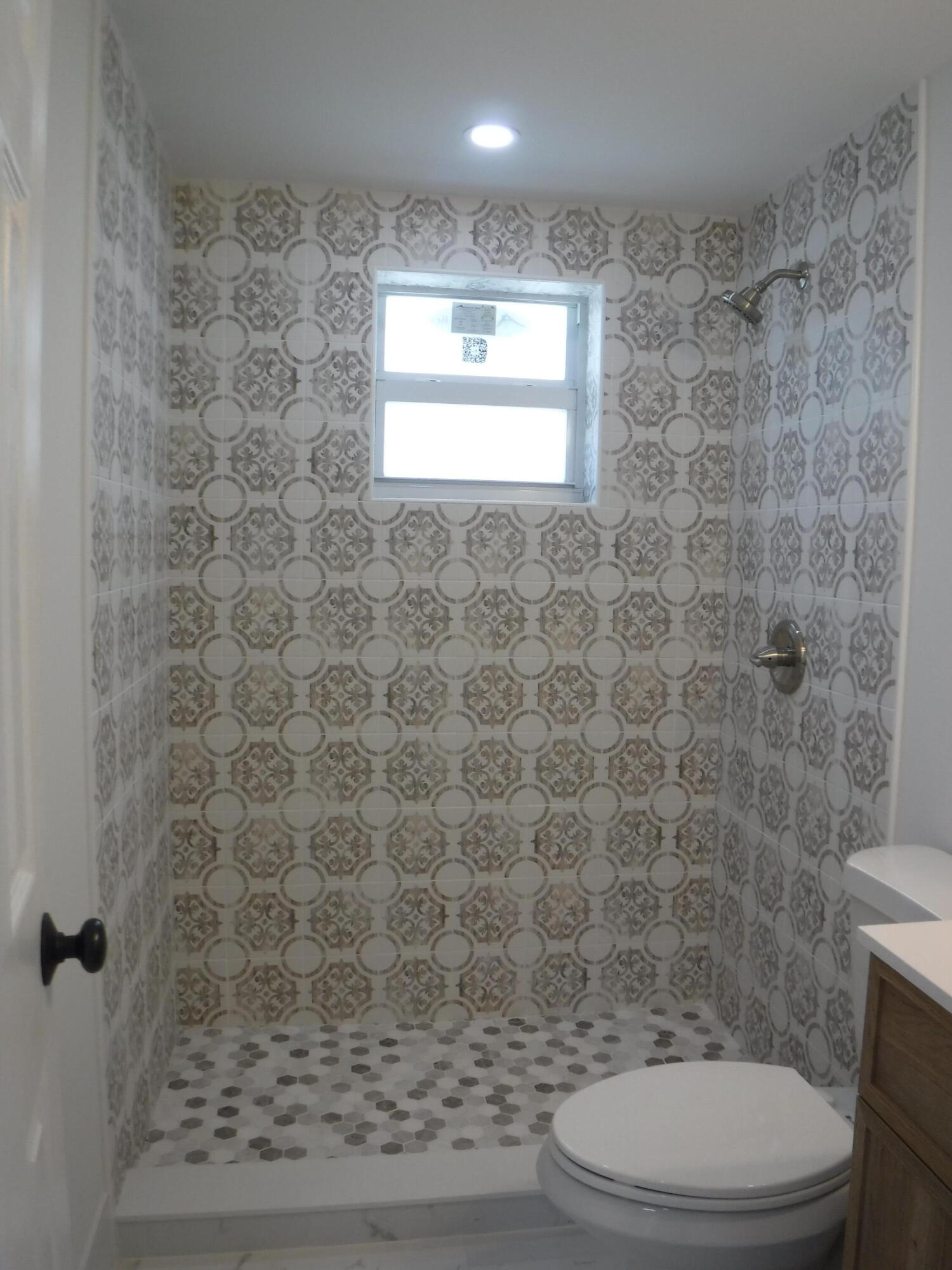 1280 Sunset Road West Palm Beach, FL 33406 - Photo 9 of 24 a bathroom with a toilet and a shower