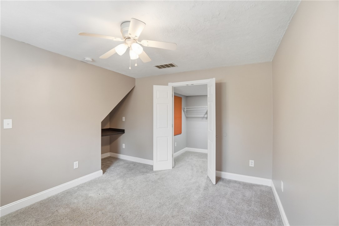 1208 Jarva Lane Springboro, OH 45066 - Photo 50 of 75 This spacious room features cozy carpeting and a convenient closet, ideal for comfortable living.