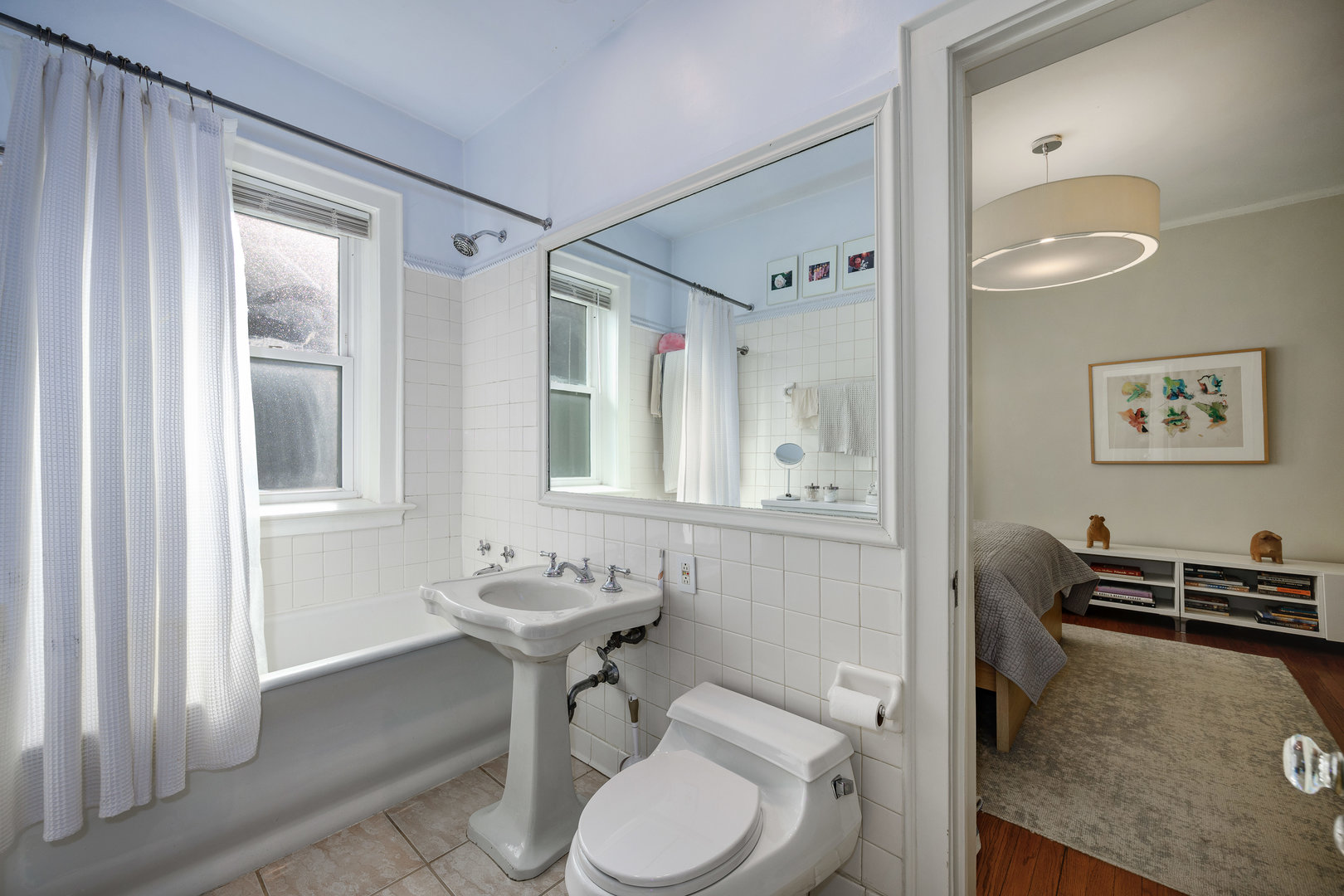 4224 North Hazel Street, Unit 3 Chicago, IL 60613 - Photo 29 of 33 a bathroom with a sink toilet and shower
