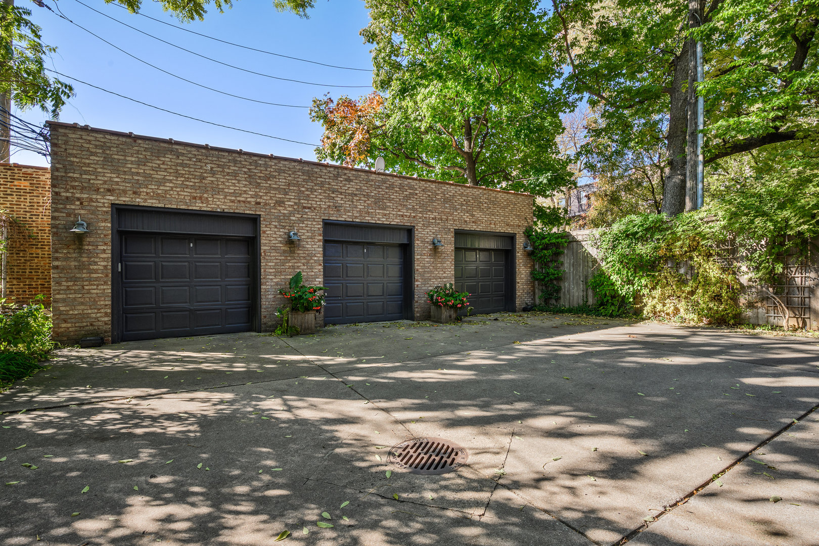 4224 North Hazel Street, Unit 3 Chicago, IL 60613 - Photo 32 of 33 a front view of a house with a yard and garage