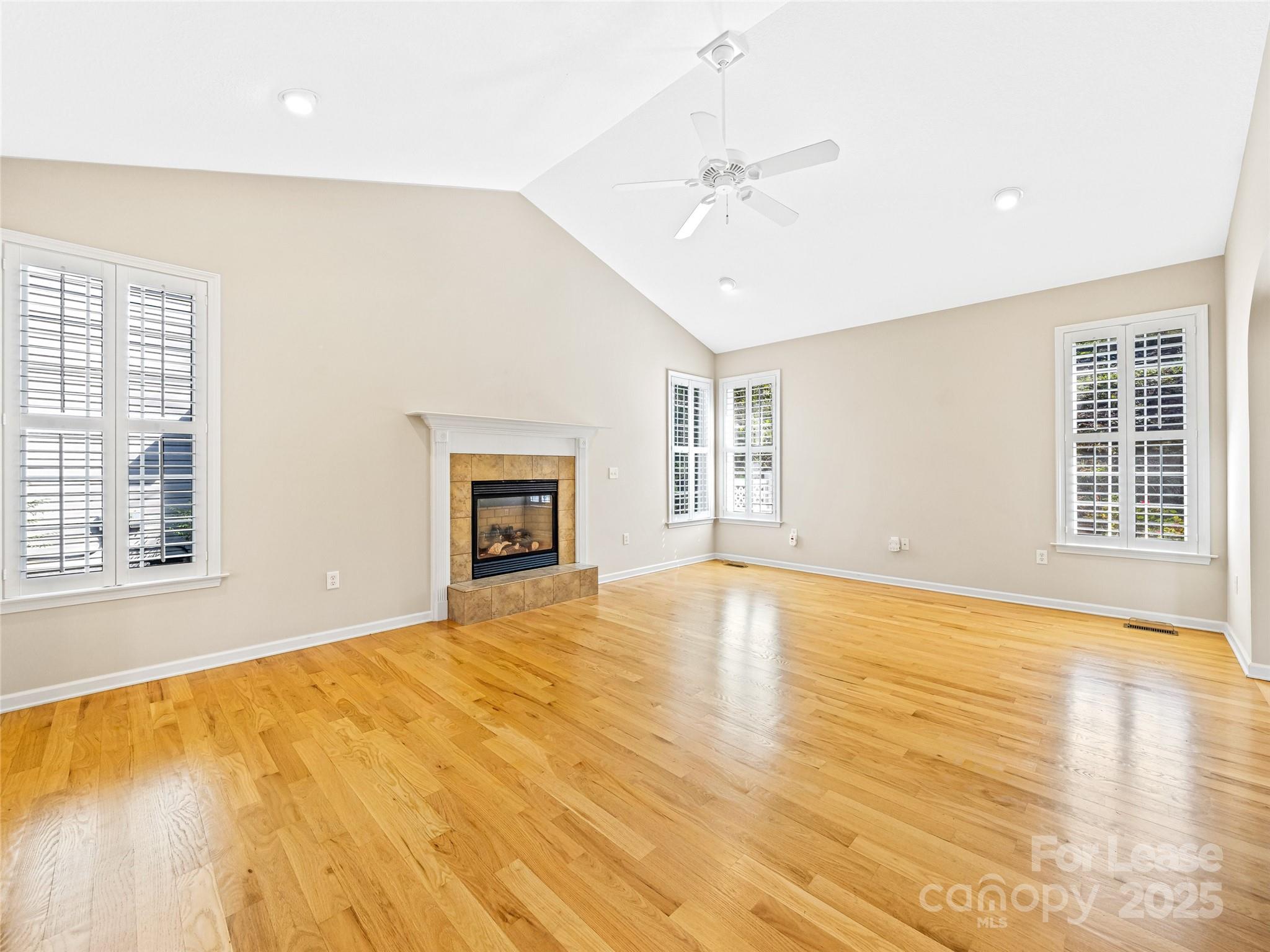 51 Driftstone Circle Arden, NC 28704 - Photo 12 of 38 a view of an empty room with window and wooden floor
