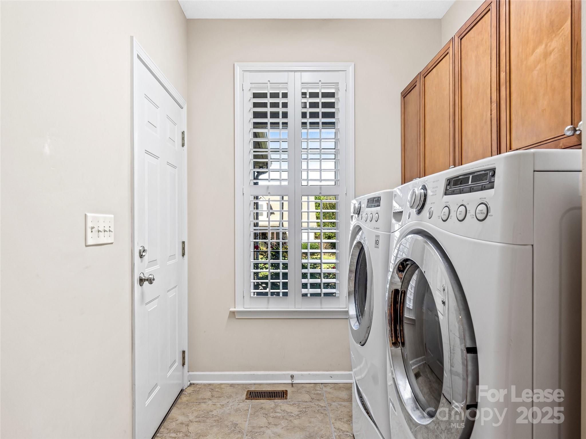 51 Driftstone Circle Arden, NC 28704 - Photo 22 of 38 a utility room with dryer and washer