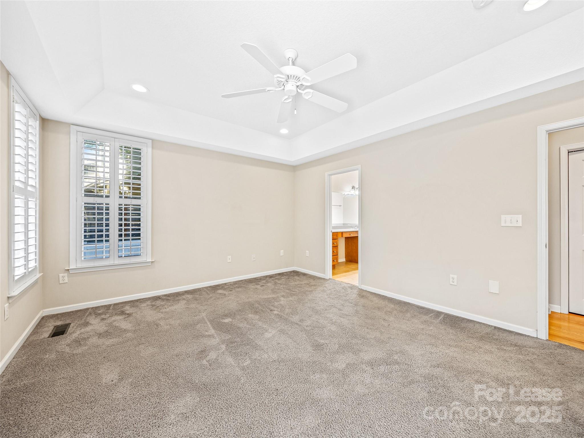51 Driftstone Circle Arden, NC 28704 - Photo 25 of 38 an empty room with windows and ceiling fan
