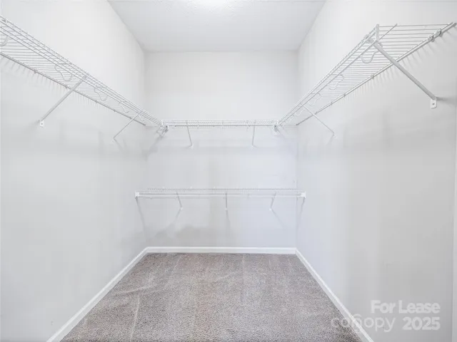 a view of a room with racks on the wall