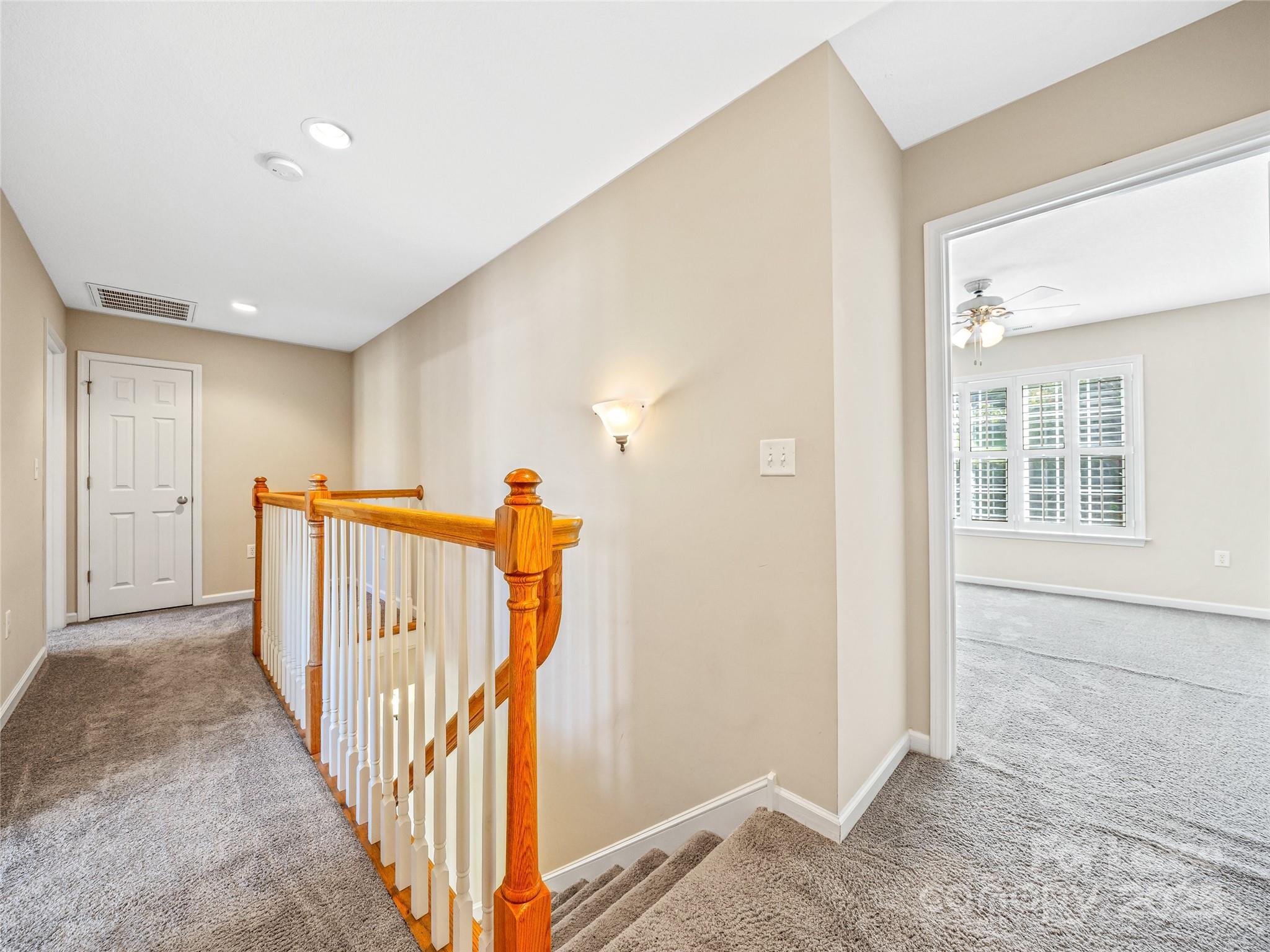 51 Driftstone Circle Arden, NC 28704 - Photo 31 of 38 a view of a hallway with wooden floor and entryway