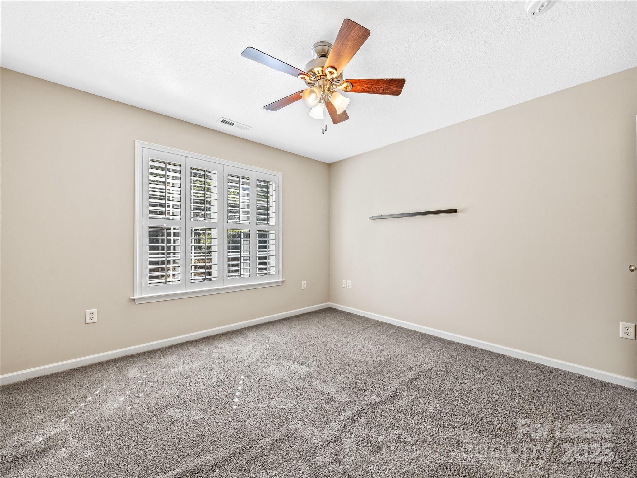 51 Driftstone Circle Arden, NC 28704 - Photo 33 of 38 a view of an empty room with a window